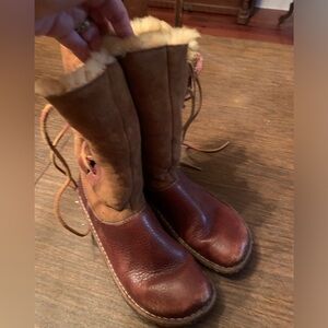 Born size 8.5 boots shearling lined ankle to calf.